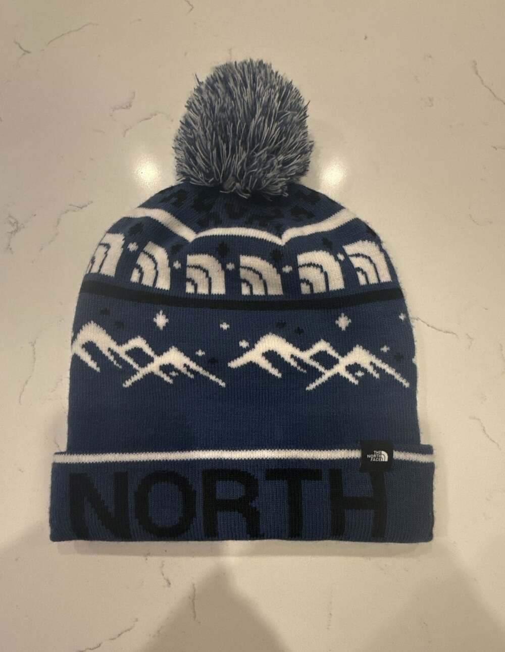 The North Face Kids Ski Tuke Pom Pom Beanie Hat Shady Blue White Black